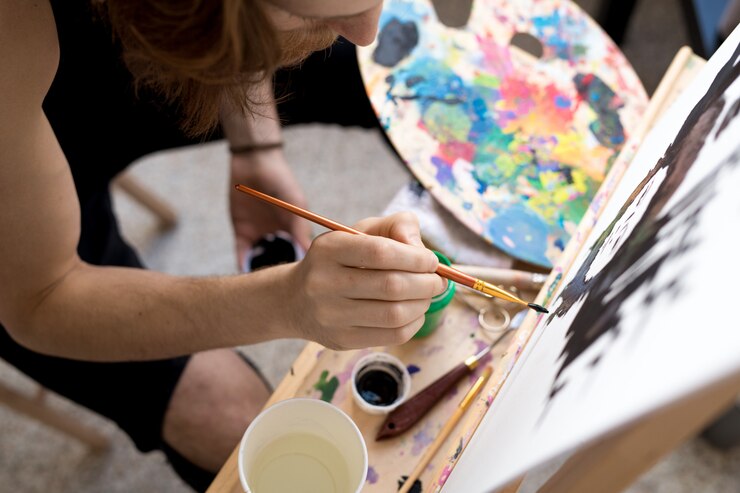 Foto cepillo de explotación de artista masculino