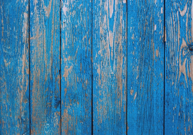 Cerca de madeira velha cor azul como pano de fundo ou textura. Tábuas de madeira pintadas vintage