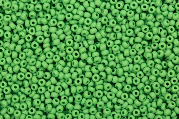 Cerca de fondo de perlas de semillas de color verde claro. Foto de alta resolución.