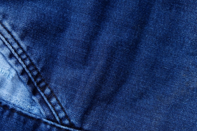 Cerca del fondo de textura de tela de jeans