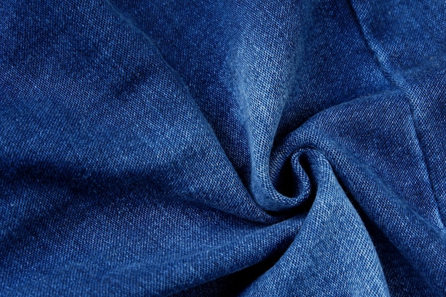 Cerca del fondo de textura de tela de jeans