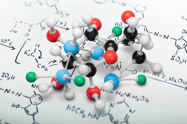 Cerca del modelo de estructura molecular en el fondo