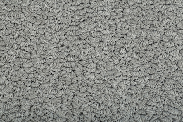 Cerca de papel tapiz de textura de alfombra gris