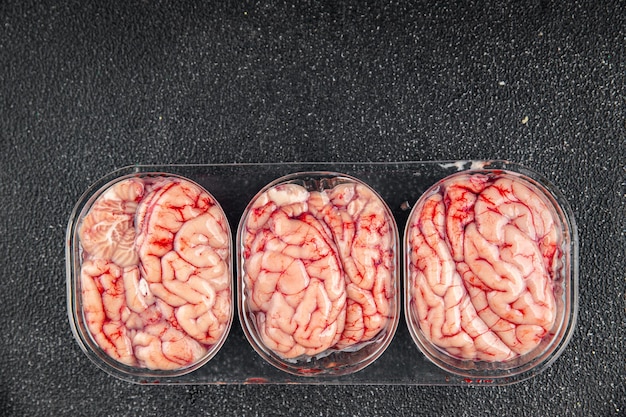 cerebro de cerdo crudo despojos comestibles comida de carne sabrosa fresca comida de cocina comida de comida bocadillo en la mesa