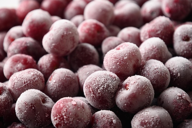 Cereza agria roja congelada como fondo refrescante de verano de bayas