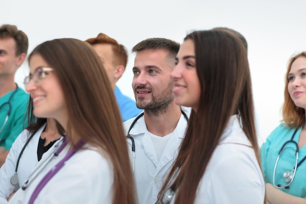 Foto cerrar un grupo de médicos juntando sus manos