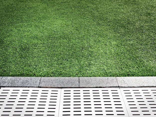 Foto césped verde del campo de fútbol