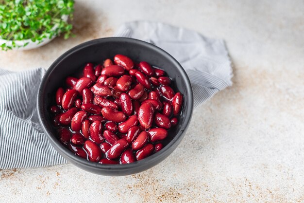 Foto ceto de feijão vermelho enlatado ou porção de dieta paleo na mesa refeição saudável