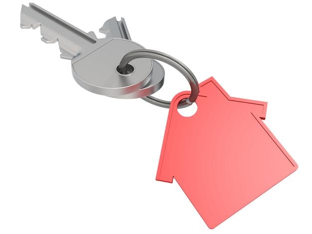 Chave de casa com ícone de casa vermelha