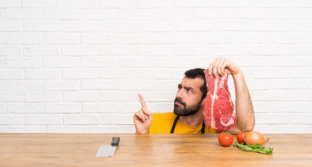 Chef em um pensamento de cozinha