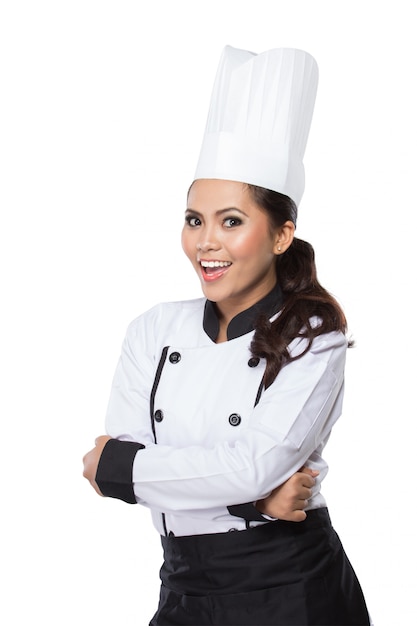 Chef femenina en un tradicional sombrero y abrigo