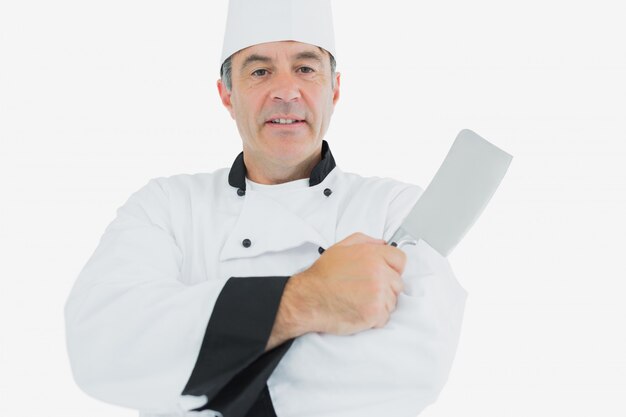 Chef masculino con cuchillo de carne