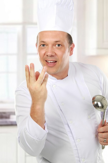 Foto chef na cozinha