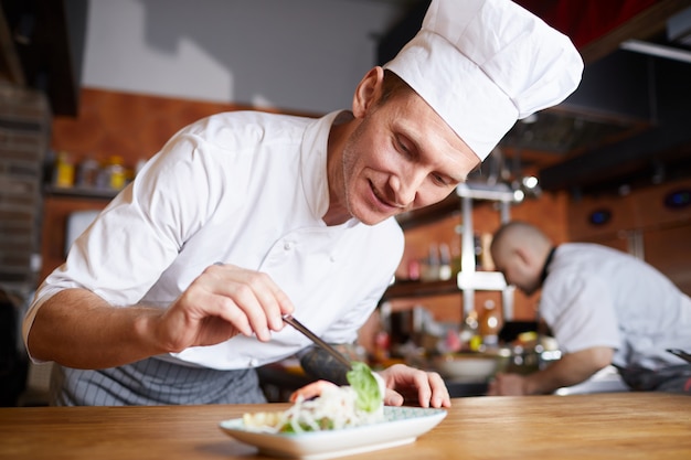 Chef Serving Beautiful Asian Dish