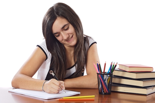 Chica atractiva estudiante sobre fondo blanco