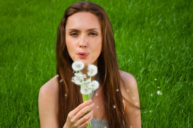 Chica con diente de león