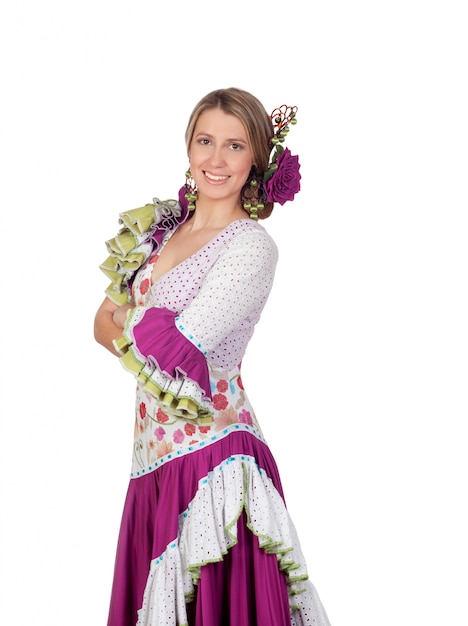 Chica española vestida en traje tradicional andaluz aislado sobre fondo blanco