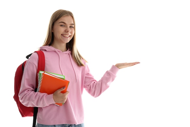 Chica estudiante atractiva aislada sobre fondo blanco