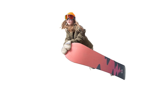 Chica snowboarder en acción aislado en blanco