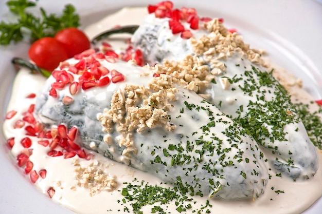 chiles relleno chiles en Nogada prato cozinha tradicional mexicana de Puebla México comida