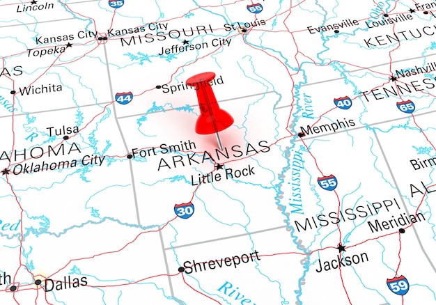 Chincheta roja sobre el mapa de Estados Unidos del estado de Arkansas. Representación 3D