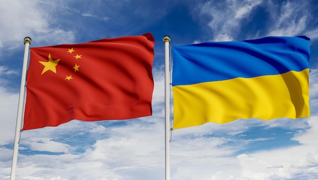 Chinesische und ukrainische Flaggen über blauem Himmel Konzept der Diplomatie-Vereinbarung internationale Beziehungen Handelsgeschäft zwischen China und der Ukraine 3D-Rendering