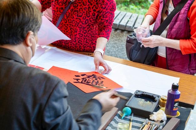 Chinesischer Frühlingsfest-Kalligraph handgeschriebene Frühlingsfest-Paare mit Pinselzeichen Chinesisches Frühlingsfest