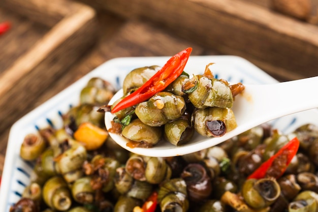 Chinesisches Essen: Gebratene Schnecken mit dreizehn Gewürzen