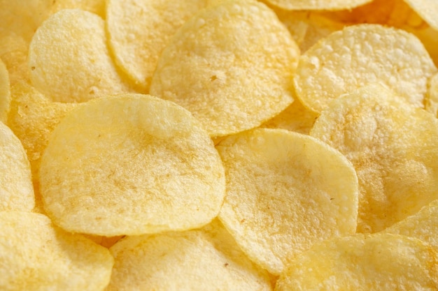 Chips de batata crocante snack textura fundo vista superior