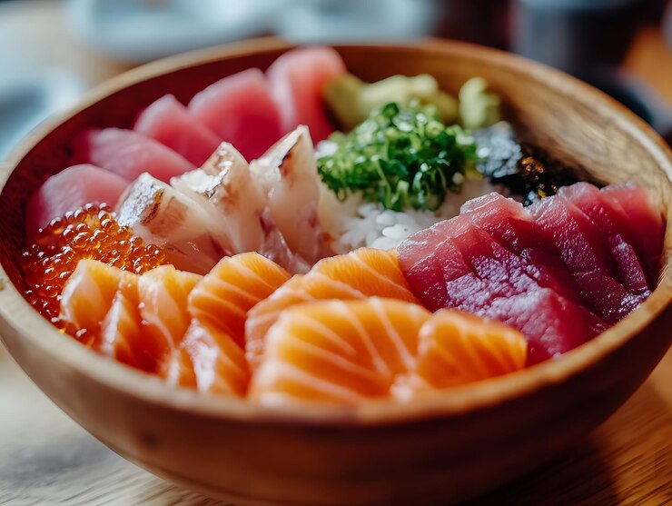 Chirashi don un plato japonés consiste en arroz sushi cubierto de pescado crudo y tortilla generada por la IA