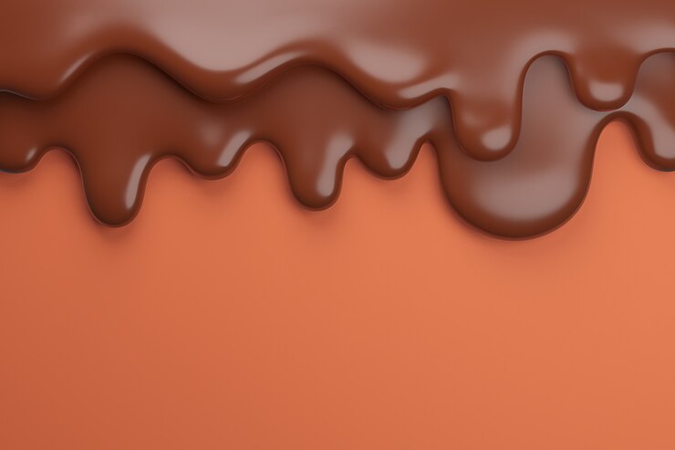 El chocolate marrón con leche derretido fluye hacia abajo,