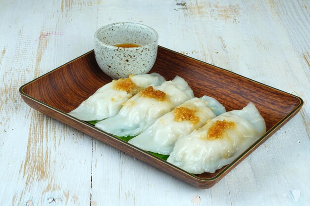 Foto choipan uno de los bollos chinos rellenos de verduras y camarones secos de cerca