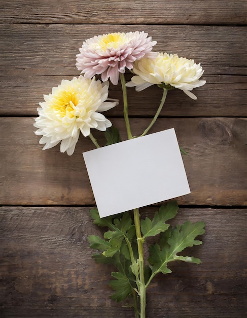 Foto chrysanthemenblume mit leerer karte auf altem holzhintergrund