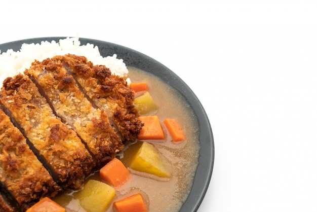 Chuleta de cerdo frita crujiente con curry y arroz