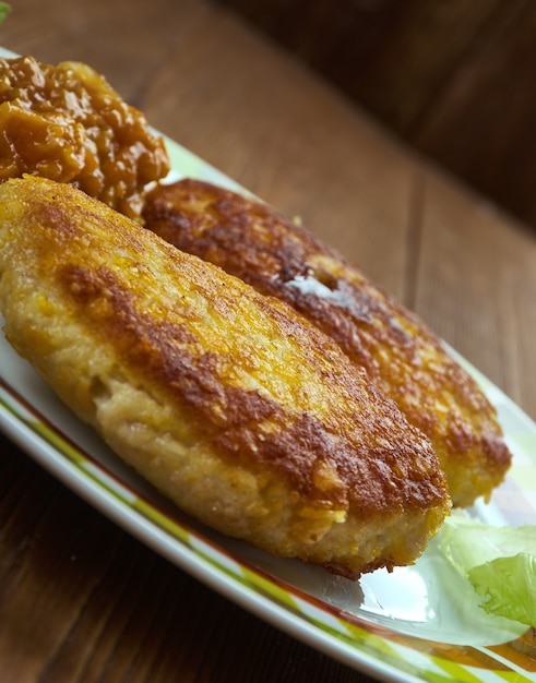 Foto chuleta valluna - costeletas de porco à milanesa colombiana