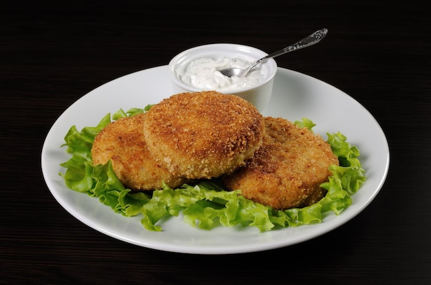 Chuletas de pollo en pan rallado