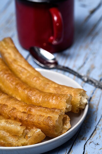 Foto churros con chocolate caliente