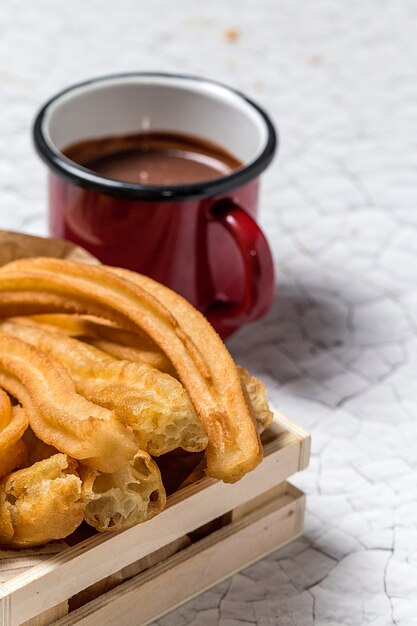 Churros com chocolate quente