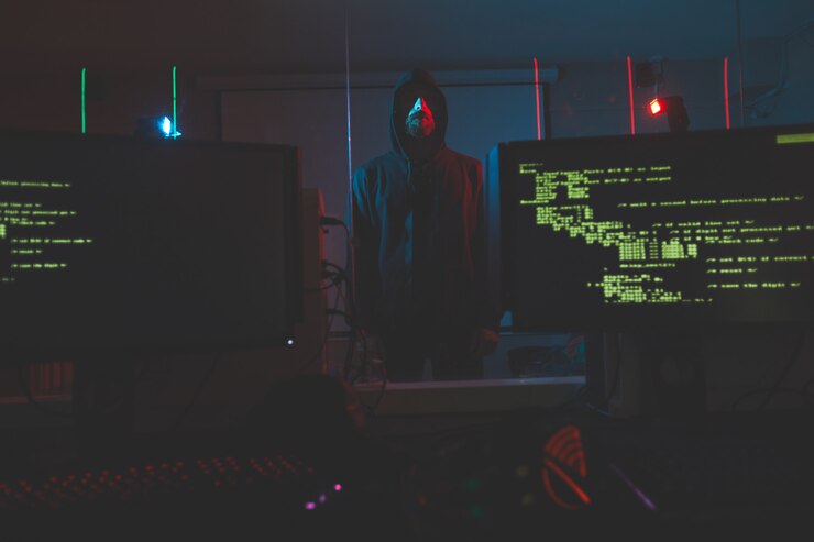 Foto ciber-terrorista en sala de computación
