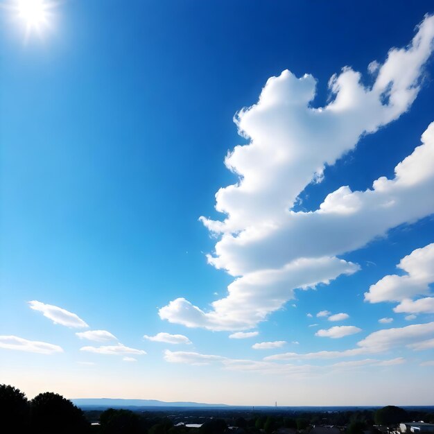 Foto un cielo azul claro con un sol y nubes