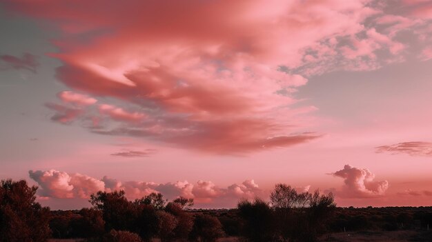 Un cielo rosa con nubes en él.