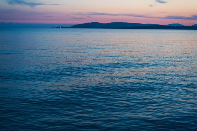 Cielo rosa sobre Capo Caccia al atardecer