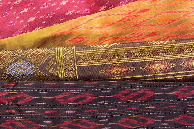 Foto cierre tailandés del modelo de la artesanía de seda para arriba, estilo de la materia textil de tailandia