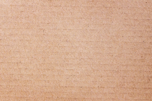 Ciérrese para arriba de la textura marrón del papel del arte para el fondo