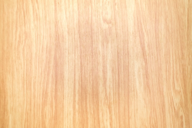 Ciérrese encima del fondo de madera ligero de la textura, ángulo de la visión superior