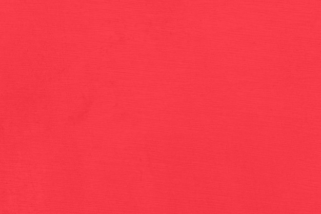 Ciérrese encima de fondo rojo de la textura del papel