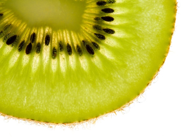 Ciérrese encima de fondo de la textura Fruta de kiwi.