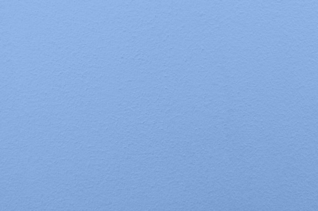 Ciérrese encima de fondo de la textura del papel azul