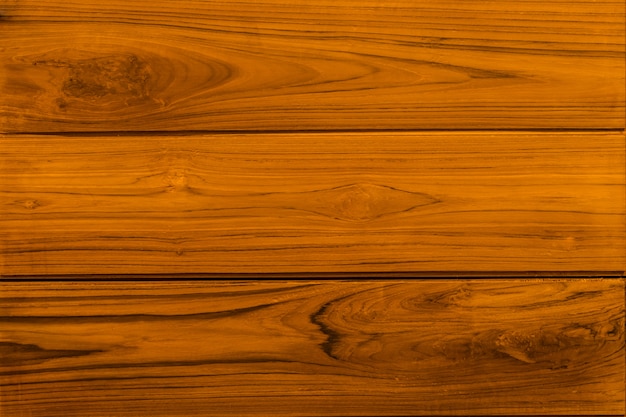 Foto ciérrese encima de la tabla de madera rústica con textura de la superficie del grano en fondo del estilo del vintage.