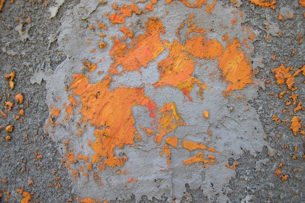 Cimento cinza e fundo de pintura de concreto e laranja